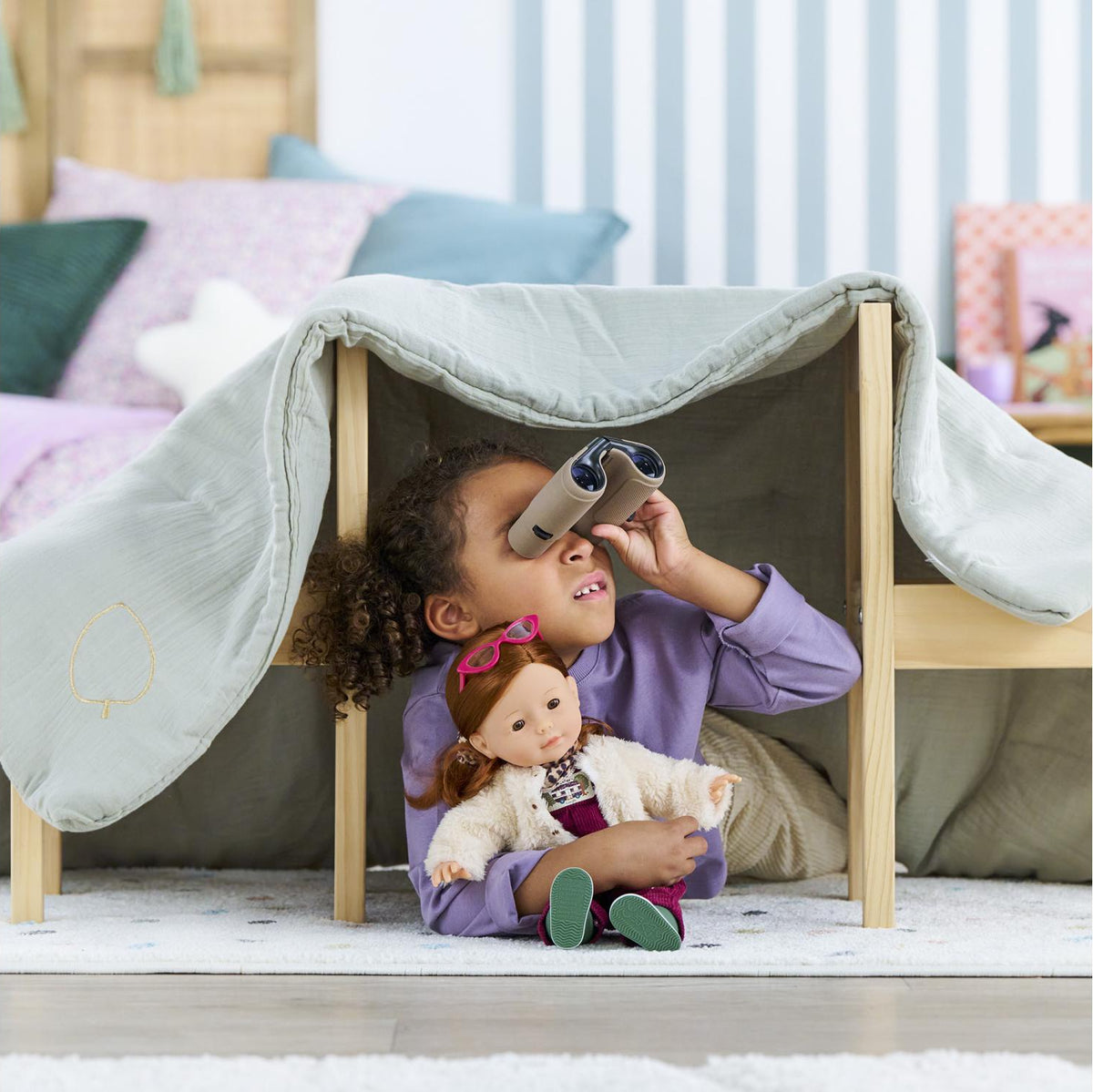 Child playing with 36cm Ma Corolle doll wearing the Trendy Explorer clothing set