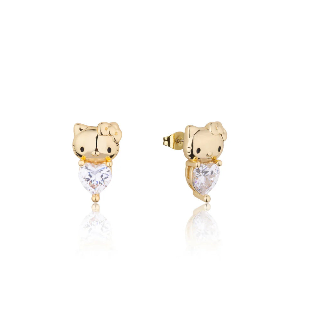 Couture Kingdom x Sanrio® Hello Kitty® April birthstone gold stud earrings featuring heart-shaped clear crystals and 14k gold plating
