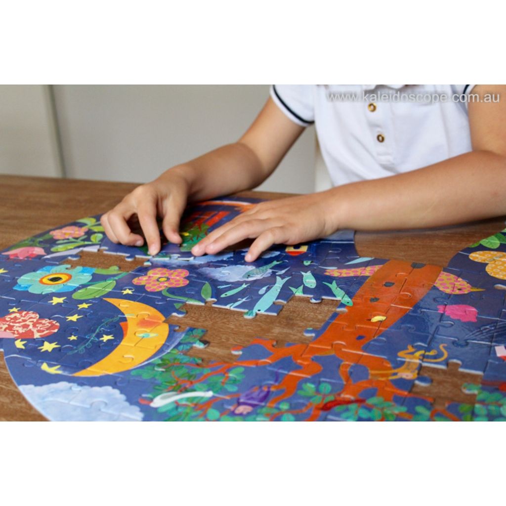 Partly completed Djeco elephant silhouette puzzle showing its colourful decorative details