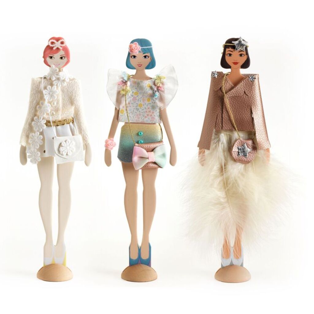 Fashion designs created with the Djeco Fashion by Caroline kit, showing outfits decorated in colour and pattern
