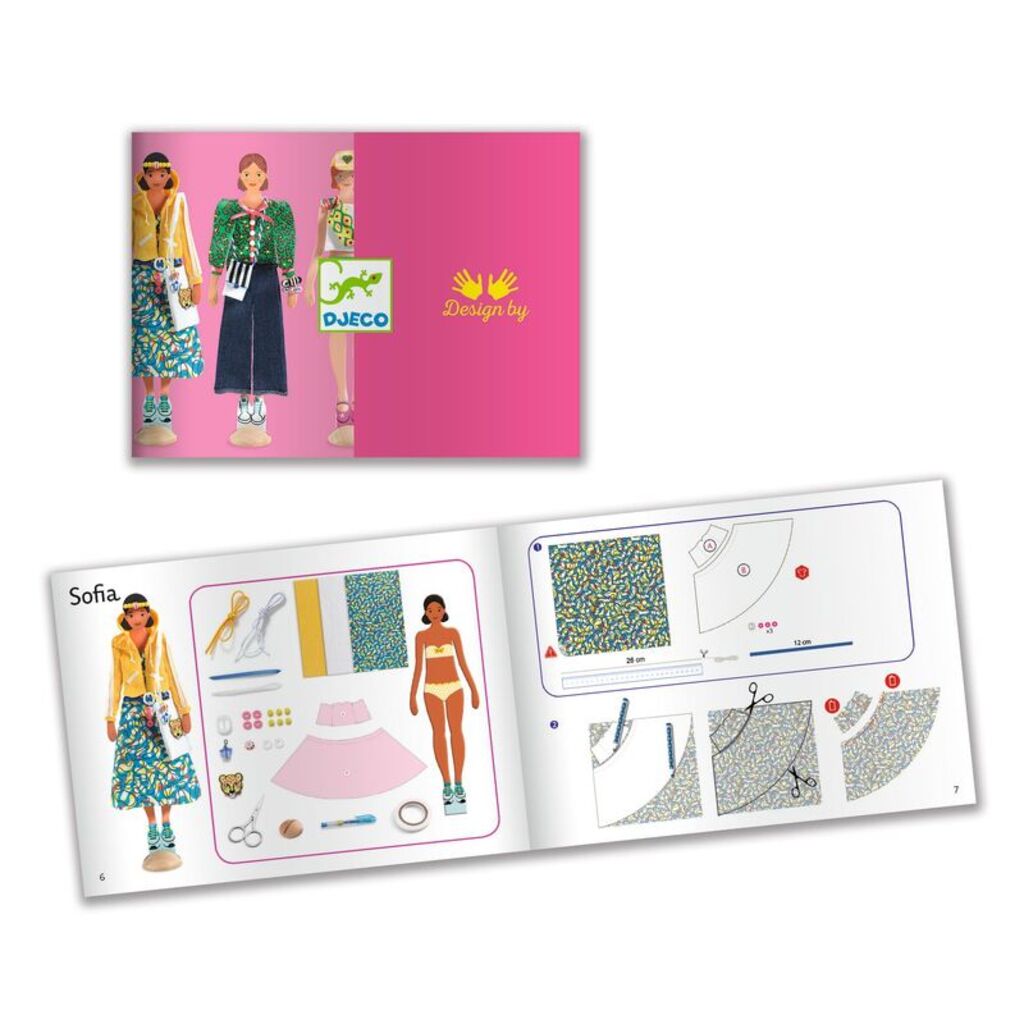 Full kit contents: printed fabrics, ribbons, beads, patterns, scissors and doll bases