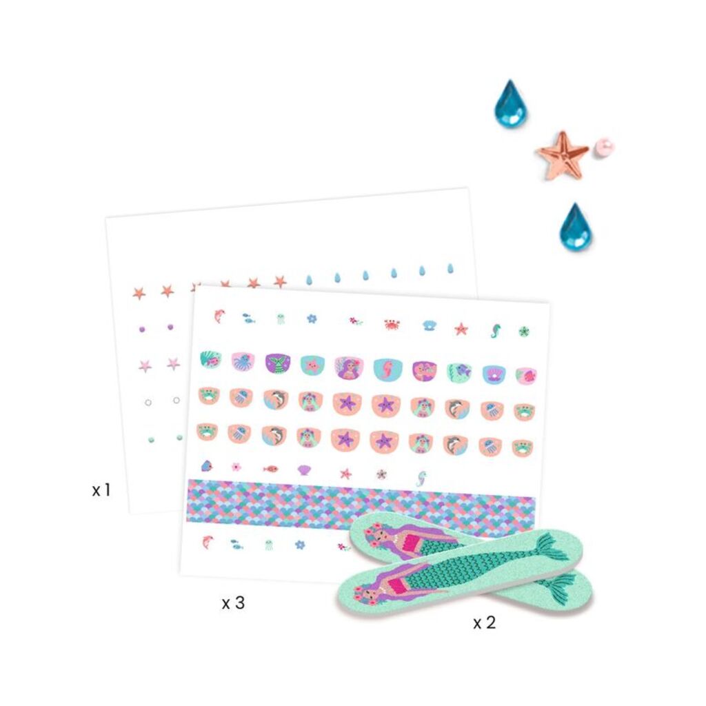 The full contents laid out: glitter sticker sheets, rhinestones and two mermaid nail files