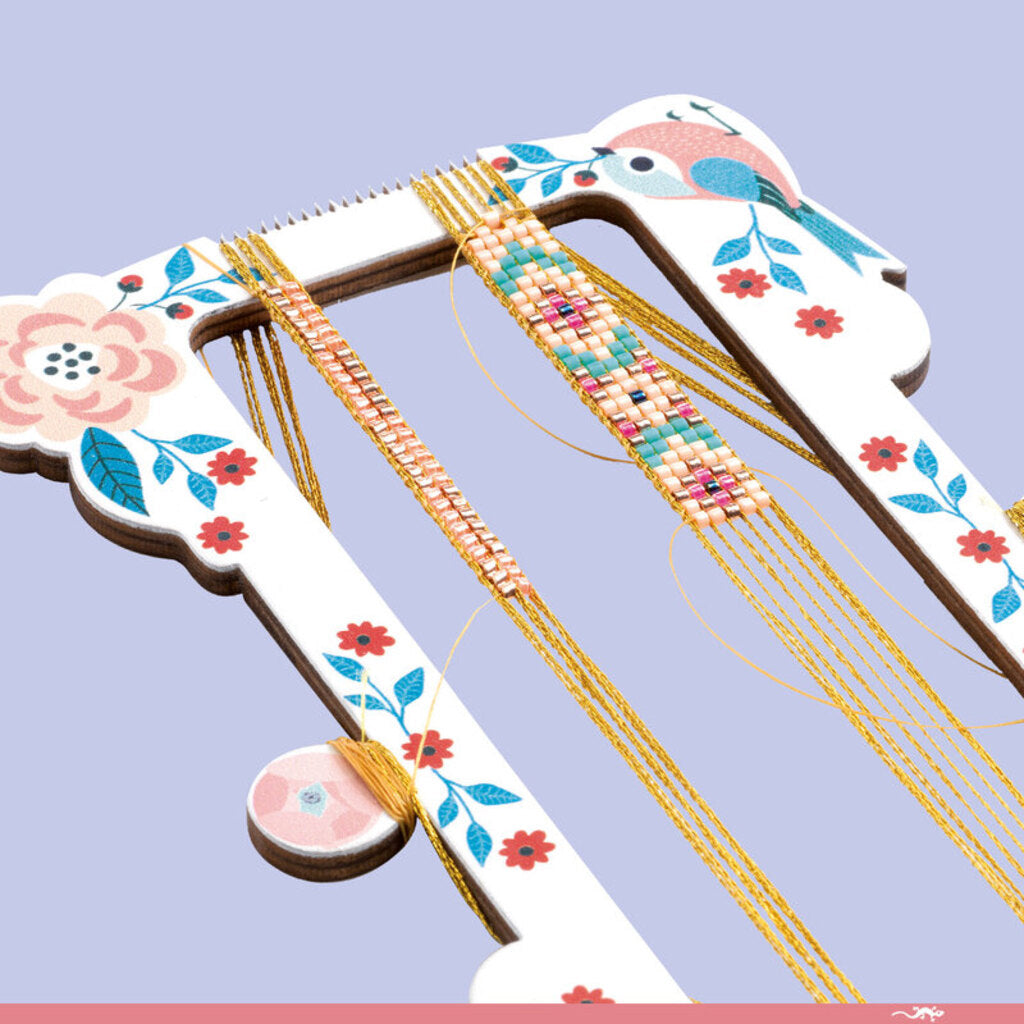 Close-up of a beaded bracelet from the Djeco Tiny Beads kit showing a repeating colour pattern