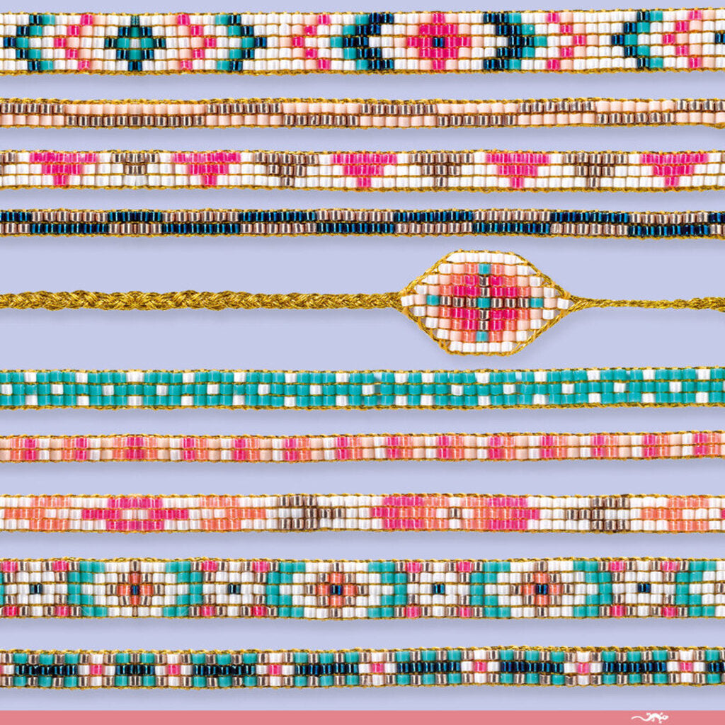 Child carefully threading tiny beads onto a cord from the Djeco Tiny Beads bracelet making set