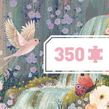 completed Djeco Fairy Lake puzzle showing a detailed panoramic landscape with a waterfall and peaceful natural scenery
