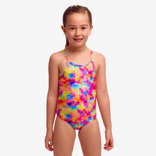 Toddler girl wearing Funkita Dry Me one piece swimmers with colourful rainbow print