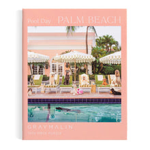Puzzle box with a poolside scene featuring dogs and a palm tree, labeled 'Pool Day Palm Beach' by Gray Malin.