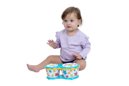 Side view of the Halilit Baby Bongos musical drum toy showing the connected drums and their height