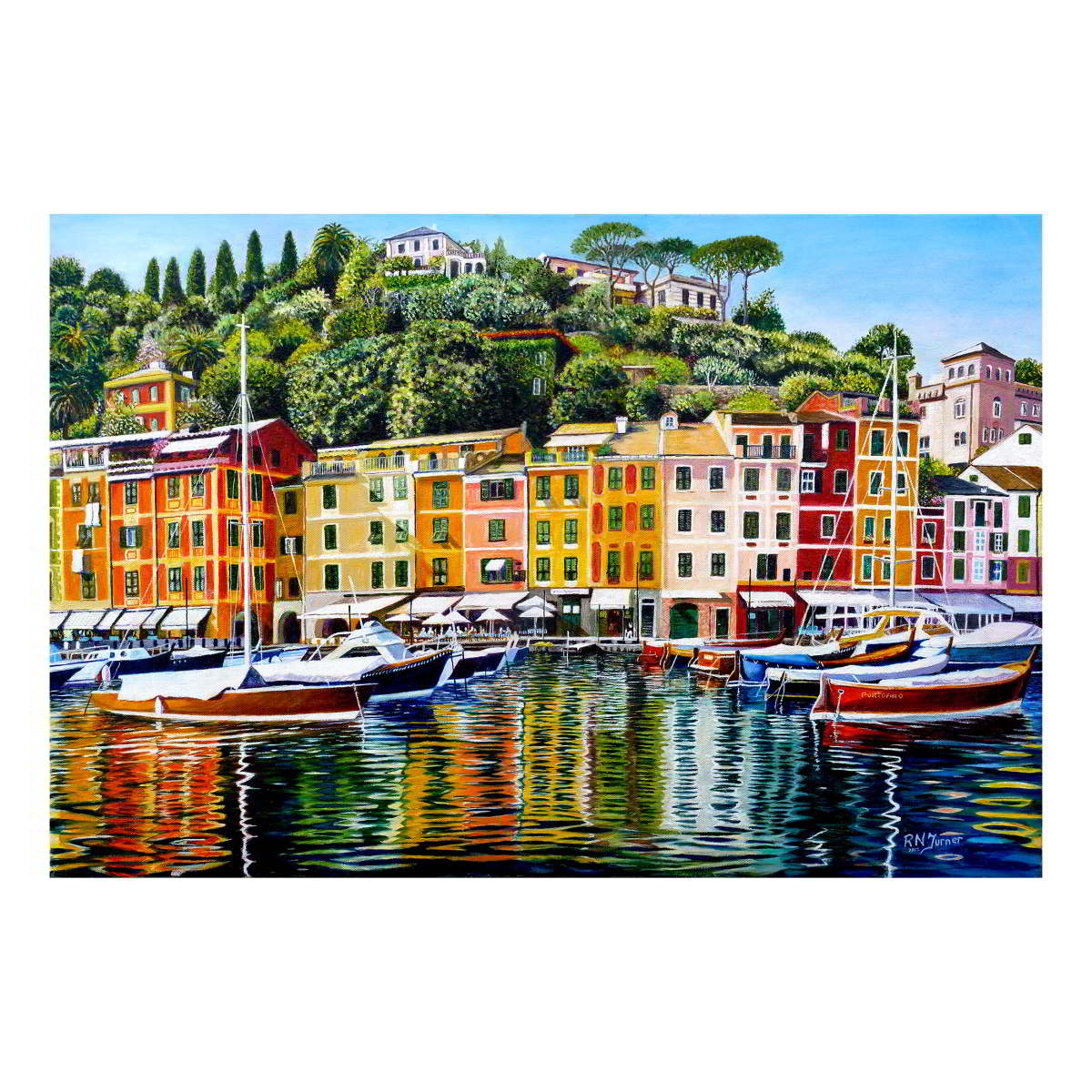 Colorful coastal town with boats in a harbor