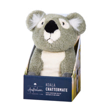 Plush koala toy in packaging on a white background