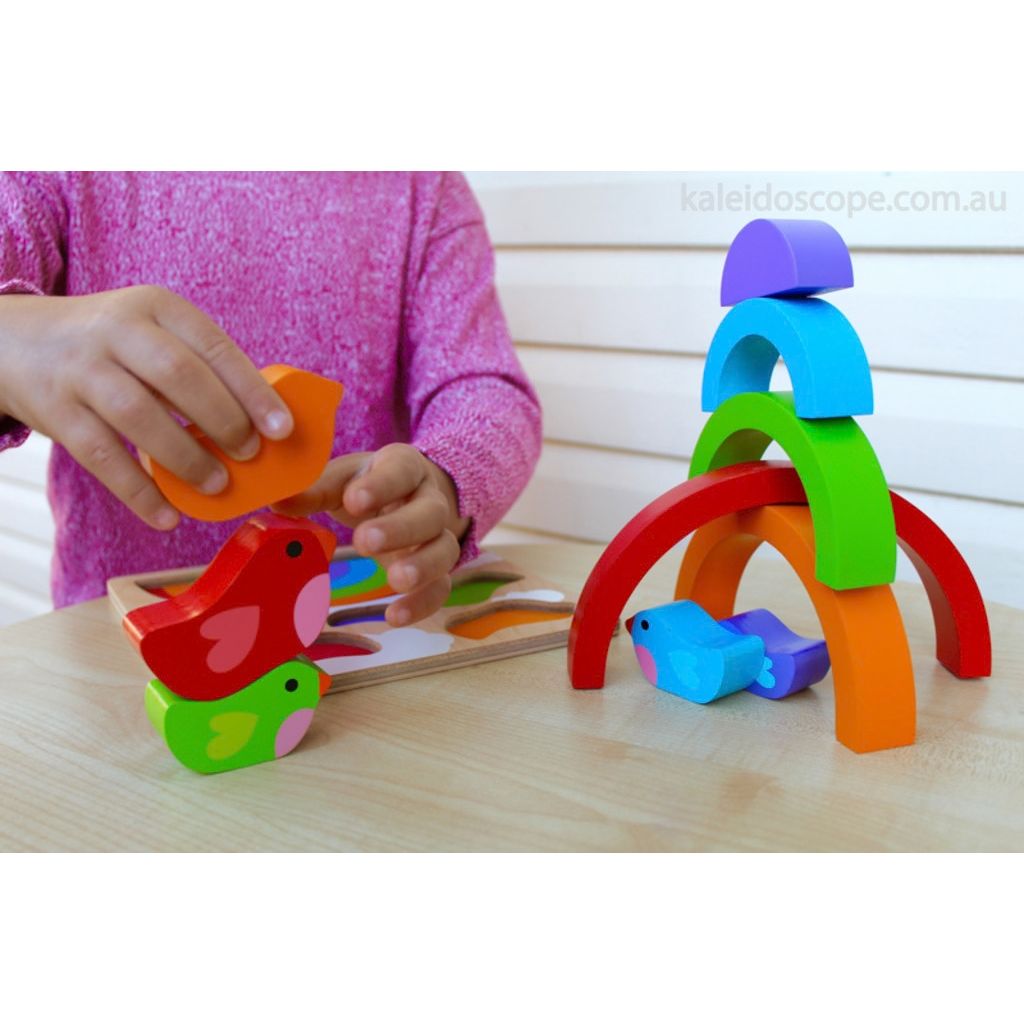 Completed Kiddie Connect bird and rainbow puzzle showing the bright bird beneath a rainbow arc
