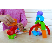 Completed Kiddie Connect bird and rainbow puzzle showing the bright bird beneath a rainbow arc