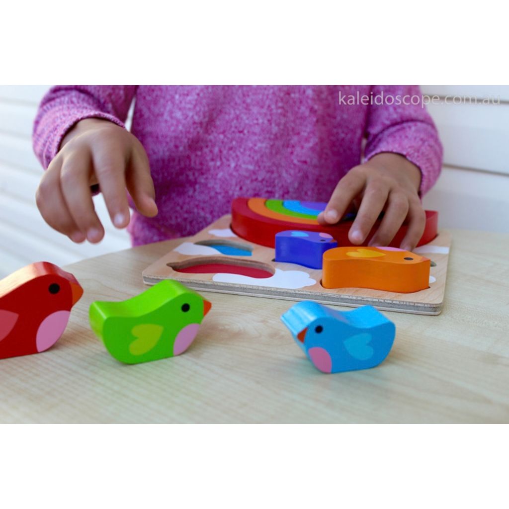 Kiddie Connect bird and rainbow puzzle pieces stacked to show their bright painted colours