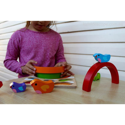 Kiddie Connect bird and rainbow wooden puzzle on a kinder table during early learning play