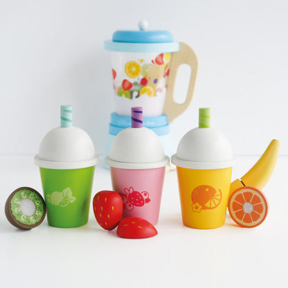 Le Toy Van Honeybake smoothies served at a pretend cafe counter alongside wooden play food