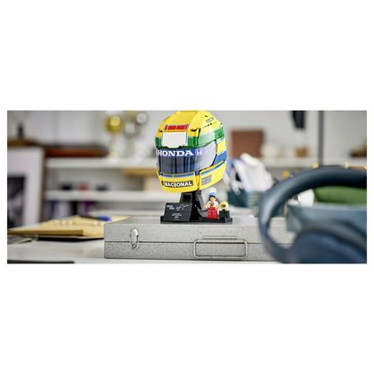 Three-quarter view of the LEGO F1 Senna helmet display model, with the visor and chin area in focus