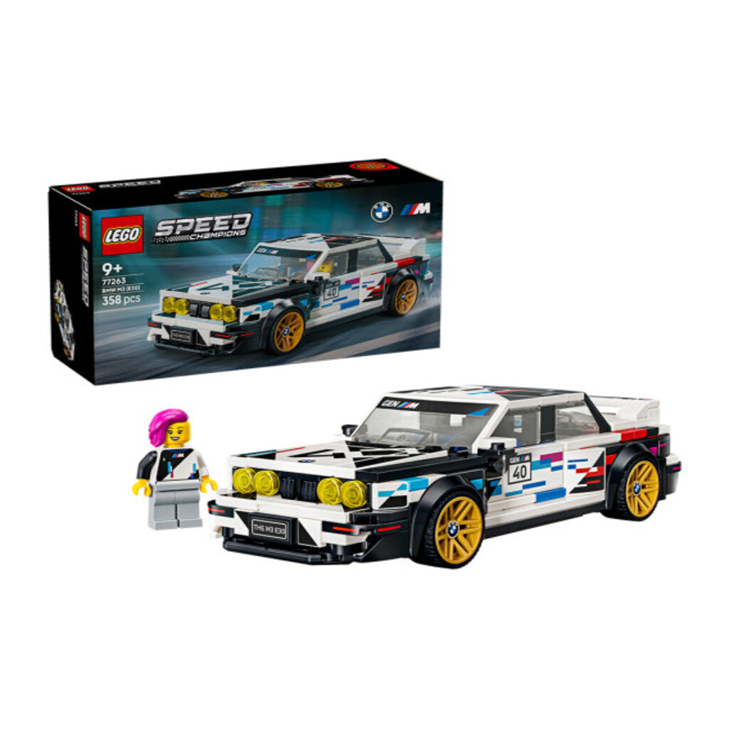 Side profile of the 17cm LEGO 77263 BMW M3 E30 shown next to its packaging for scale