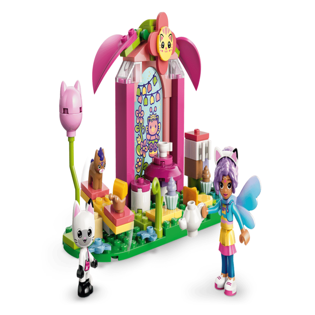 Tea party scene from the LEGO 11214 fairy set arranged on a bedroom floor during play