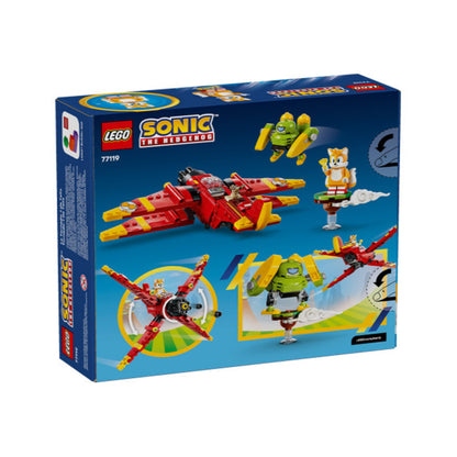 Child flying the LEGO Tails' Tornado-1 plane by hand during play on a living room floor