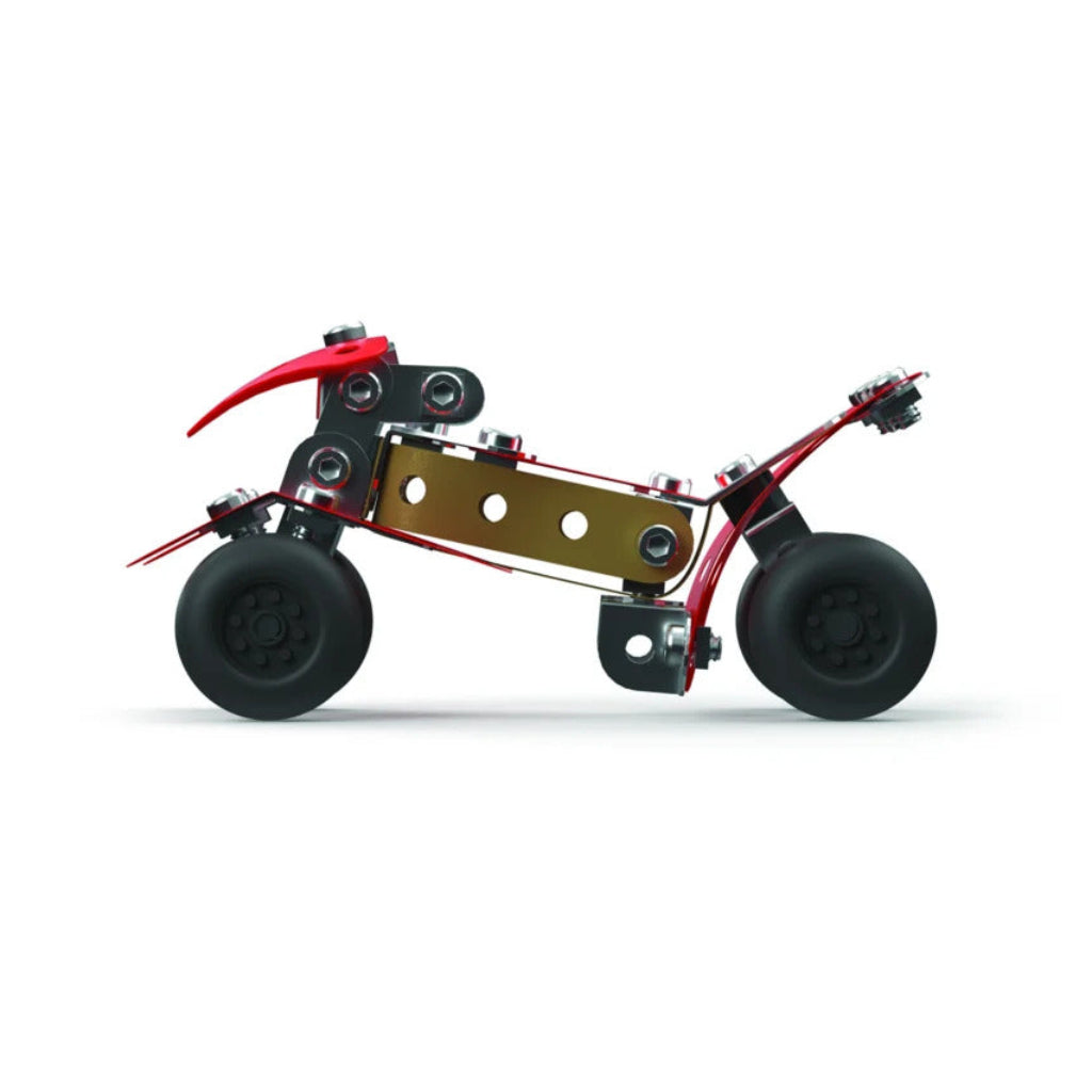 A compact red and gold robotic vehicle or miniature chassis with black wheels, shown in profile against a clean white background.