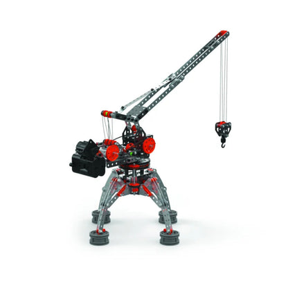 A toy construction crane built from interlocking plastic building blocks, featuring a gray and black body with red accents, a long articulated arm, and a hanging hook with cables, shown on a plain white background.