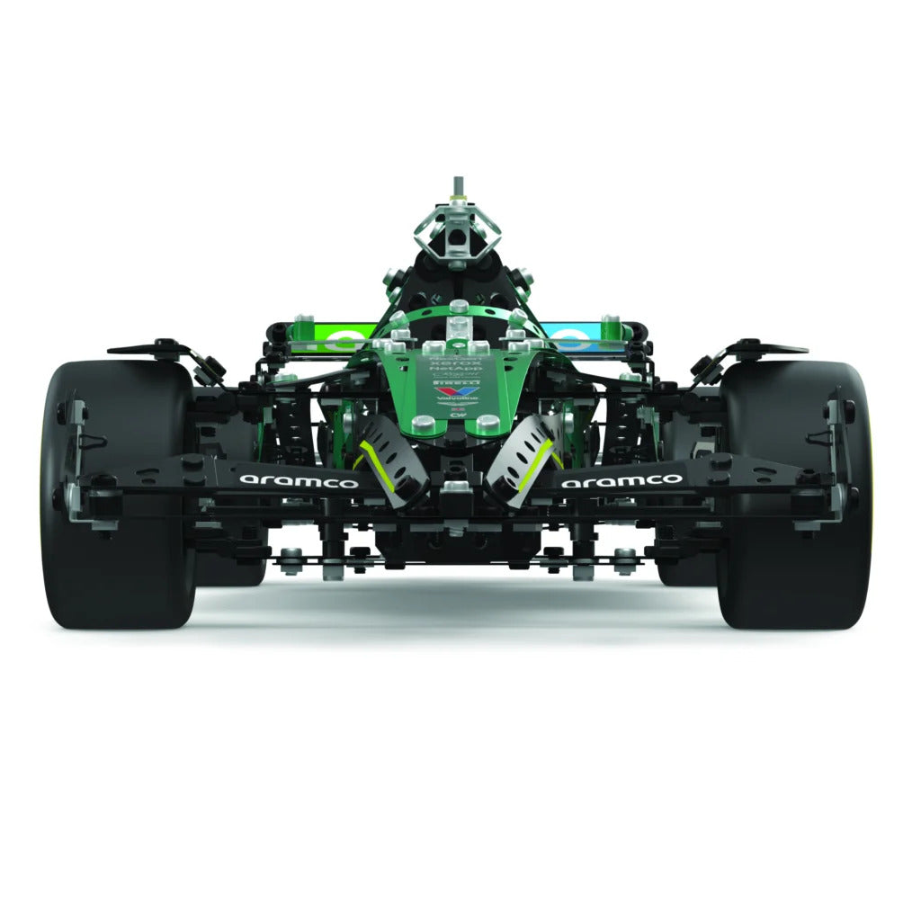 A front-facing view of a green and black Formula 1 racing car chassis, resembling a Mercedes-AMG F1 car, on a clean white background. Visible branding includes 'aramco' on the front and rear wheel spacers and 'Mercedes' on the nose of the car.