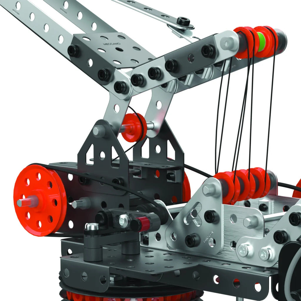 Detailed view of Meccano Pro crane boom assembly with metal beams, orange pulleys, cables and connecting bolts.