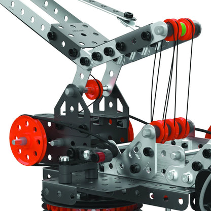 Detailed view of Meccano Pro crane boom assembly with metal beams, orange pulleys, cables and connecting bolts.