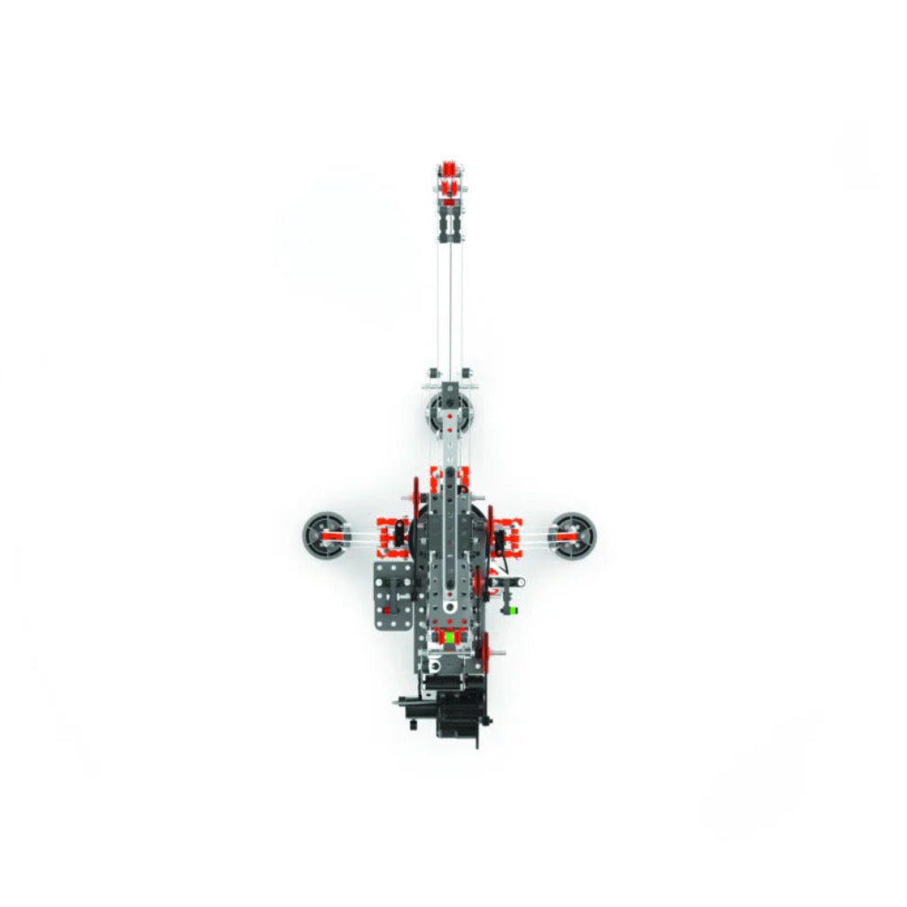Overhead view of Meccano Pro motorised crane showing metal construction beams, central mechanism and extended boom.