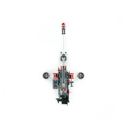 Overhead view of Meccano Pro motorised crane showing metal construction beams, central mechanism and extended boom.
