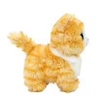 Side view of the Melanie the Gold Cat Regular 15cm Ty plush with the red Ty Heart swing tag attached