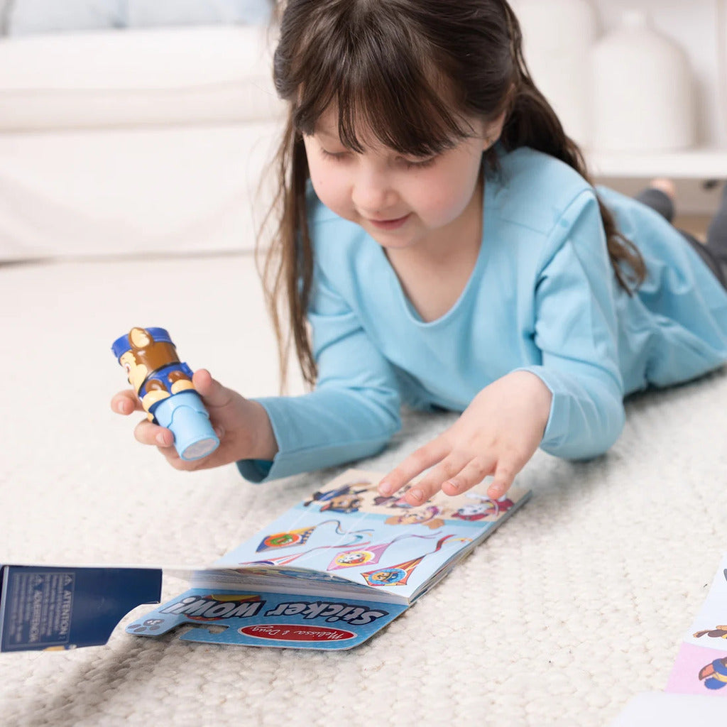 Inside page of the 24-page PAW Patrol Chase activity pad with counting and matching games
