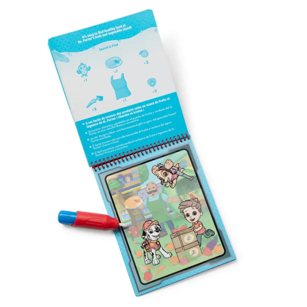 Marshall stamper pressing a PAW Patrol sticker onto an activity pad page with no peeling needed