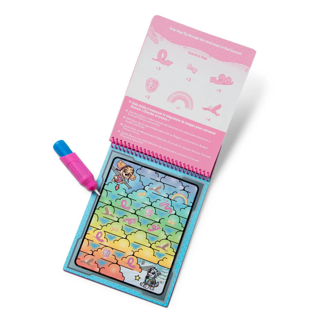 Skye stamper pressing a PAW Patrol sticker onto an activity pad page with no peeling needed