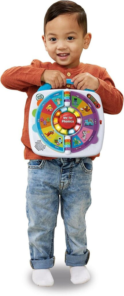 Close-up of the My 1st Phonics Spin and Learn light-up screen showing a letter during phonics play