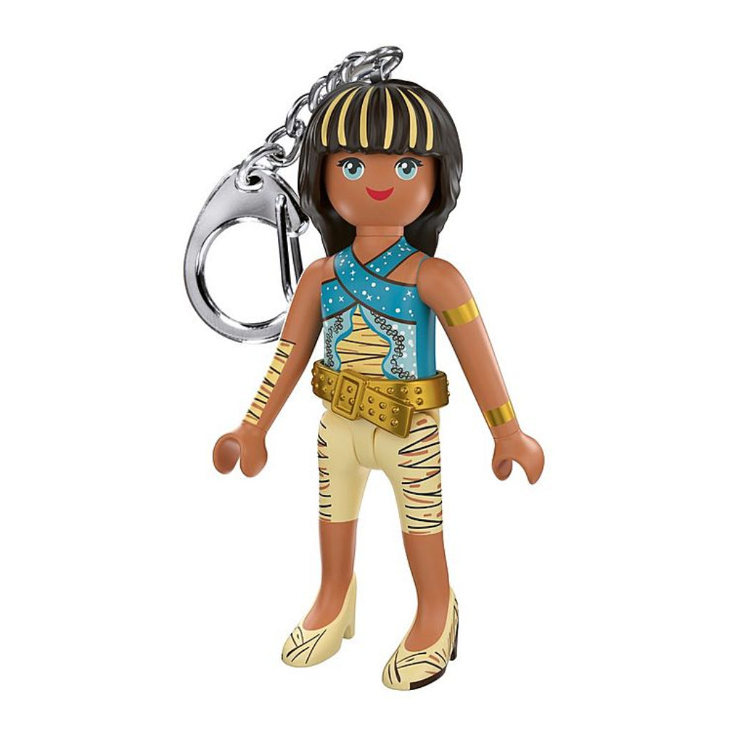 PLAYMOBIL Monster High Cleo De Nile keychain featuring a figurine with black and gold striped hair, turquoise and gold outfit, gold accessories and silver metal keyring.