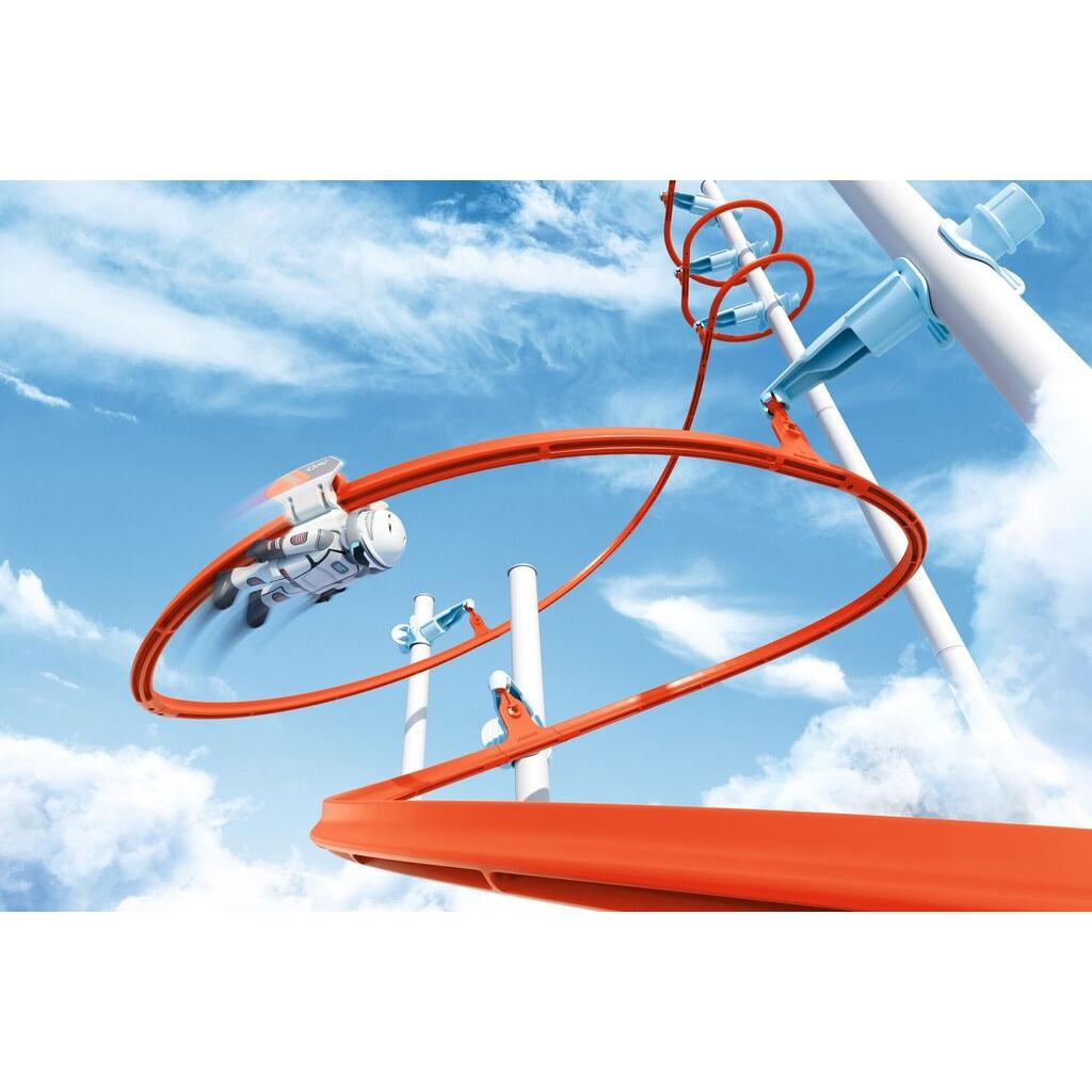 Child building a suspended Sky Trails route at home, adjusting the height and angle of the track