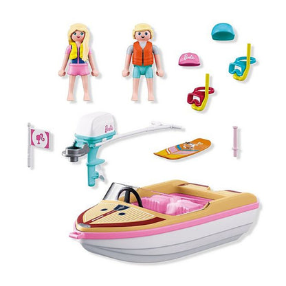 PLAYMOBIL x Barbie Adventure Boat 21-piece set showing speedboat, Barbie and Ken figures, wakeboard and accessories