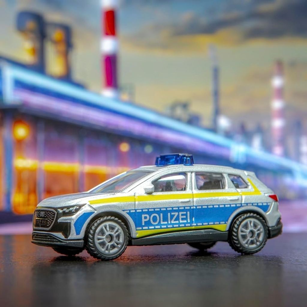Angled overhead view of the Siku police intervention vehicle, a compact die-cast toy for pretend emergencies