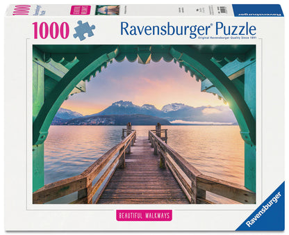 Ravensburger Romantic FootBridge at Lac d'Annecy 1000 piece puzzle featuring lakeside walkway, alpine mountains and sunset scenery