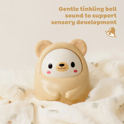 Rear view of the roly poly bear showing the smooth domed base that holds the chime inside