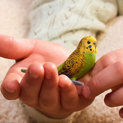 Schleich Budgie figure viewed from above showing its hand-painted wing barring and back feathers