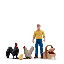 Schleich Chirpy Parade Pocket Set 81535 featuring Paul figurine, patterned hen, black rooster, yellow chick, basket and eggs in a 6-piece farmyard playset.