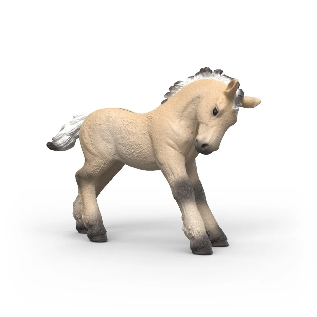 Schleich Collectible Foal Ragnar hand-painted figurine showing its beige, black and white markings