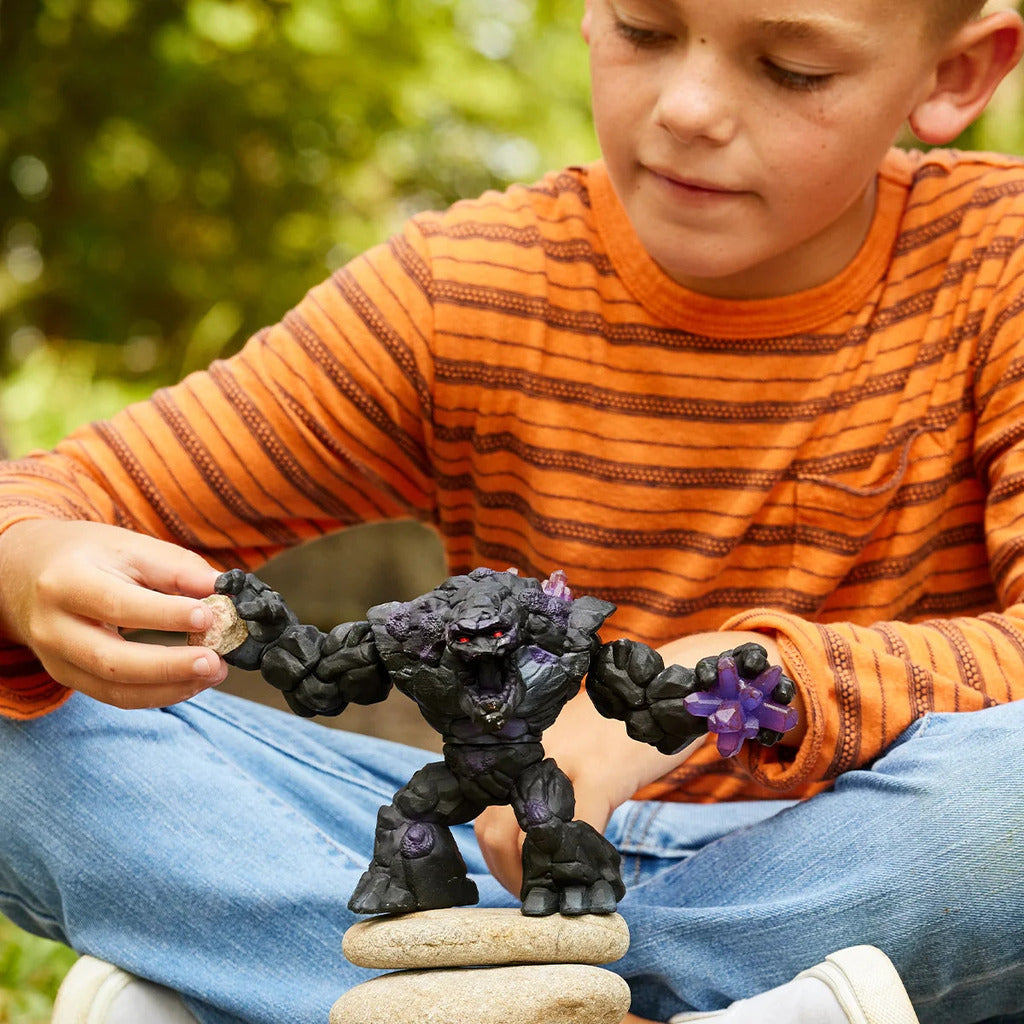 Shadow Giant shown beside a standard Eldrador creature figure to demonstrate its larger scale
