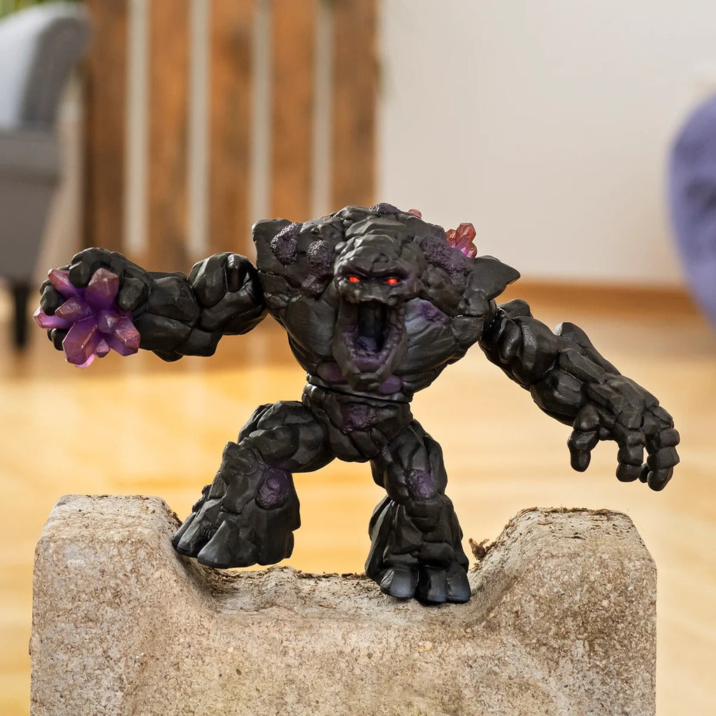 Shadow Giant viewed from above showing its armoured shoulders and violet paint highlights