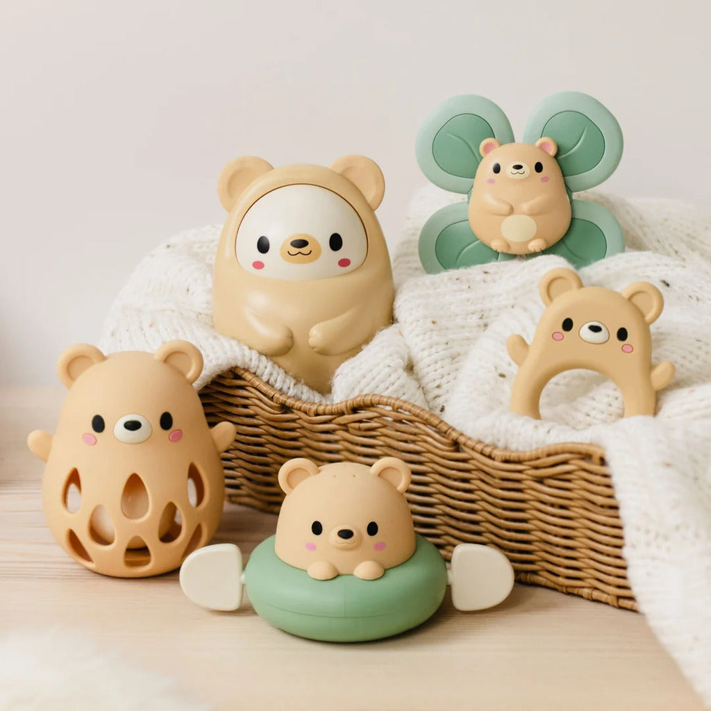 Bear silicone baby rattle shown in retail packaging with BPA free and age suitability labelling