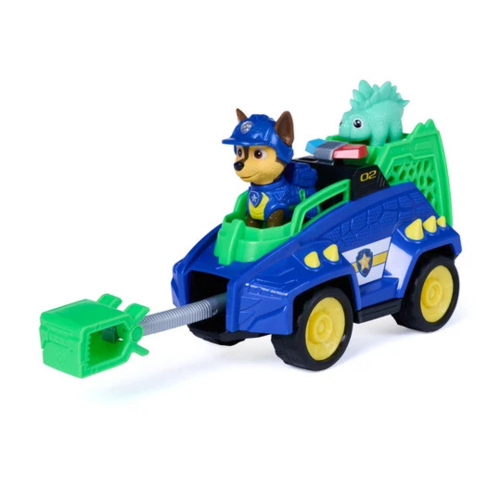 Chase seated in the cab of his dinosaur-themed cruiser with the dinosaur figure loaded behind him