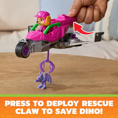 Collectible Skye pup figure standing beside her pink Dino Rescue Jet from PAW Patrol: The Dino Movie