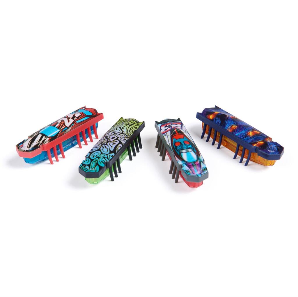 Two HEXBUG Flash Nano robotic bugs racing each other across a smooth floor in a head-to-head micro bug race